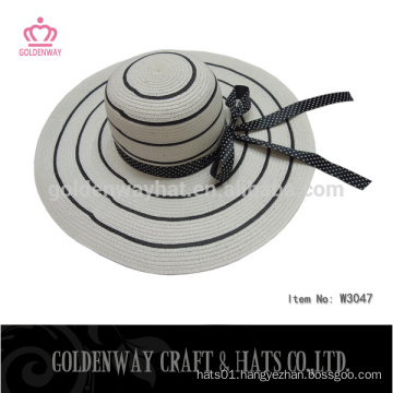 white and black paper lady hats with ribbon floppy women top hats